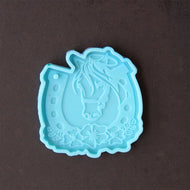 41 Hoefijzer met paardenhoofd