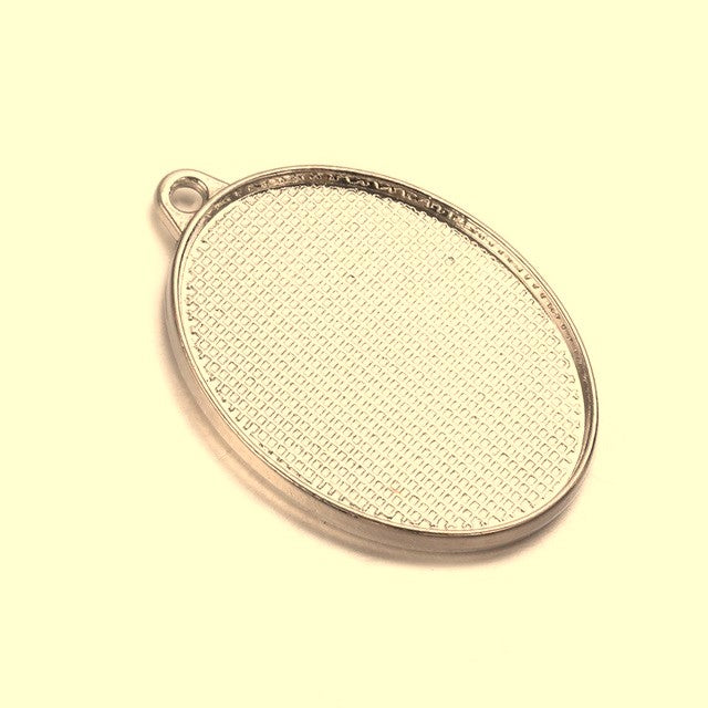 Dubbelzijdige hanger ovaal G